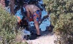 Foça’da ağaçların arasında mangal yakan kişiye tepki
