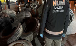 Kemalpaşa'da araç lastiklerine gizlenmiş 8 bin 550 paket kaçak sigara ele geçirildi; 2 tutuklama