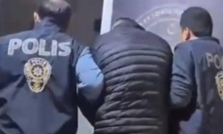 İzmir'de 50 yıl hapis cezasıyla aranan şüpheli gardıropta yakalandı