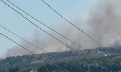 Çeşme'de çöplük yangını makilik alana sıçradı: Havadan ve karadan müdahale sürüyor